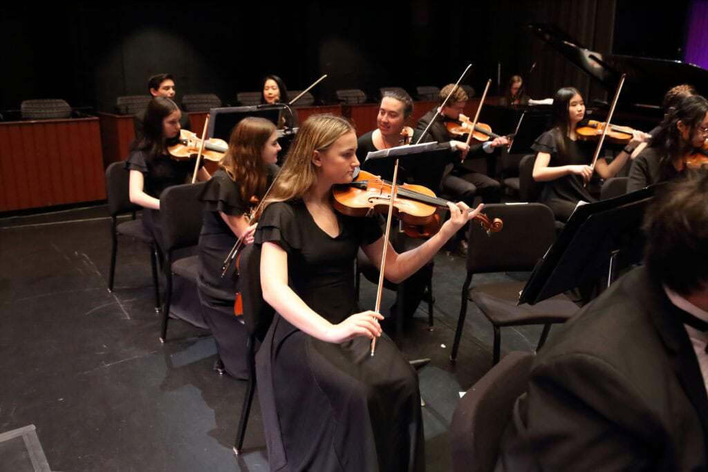 Young musicians performing side by side with Philharmonic musicians